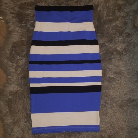 bebe Dresses & Skirts - Bebe Midi Skirt with back slit. Very stretchy bebe Dresses & Skirts - Bebe Midi Skirt with back slit. Very stretchy